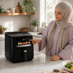 Friteuse à air Nova 6 ouverte avec des toasts dorés dans le panier