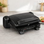 Gril Tefal Toast Expert ouvert vue de face sur plan de travail en marbre