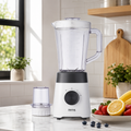 Blender Taurus Power Max 1300 sur plan de travail en marbre blanc avec fraises et citron